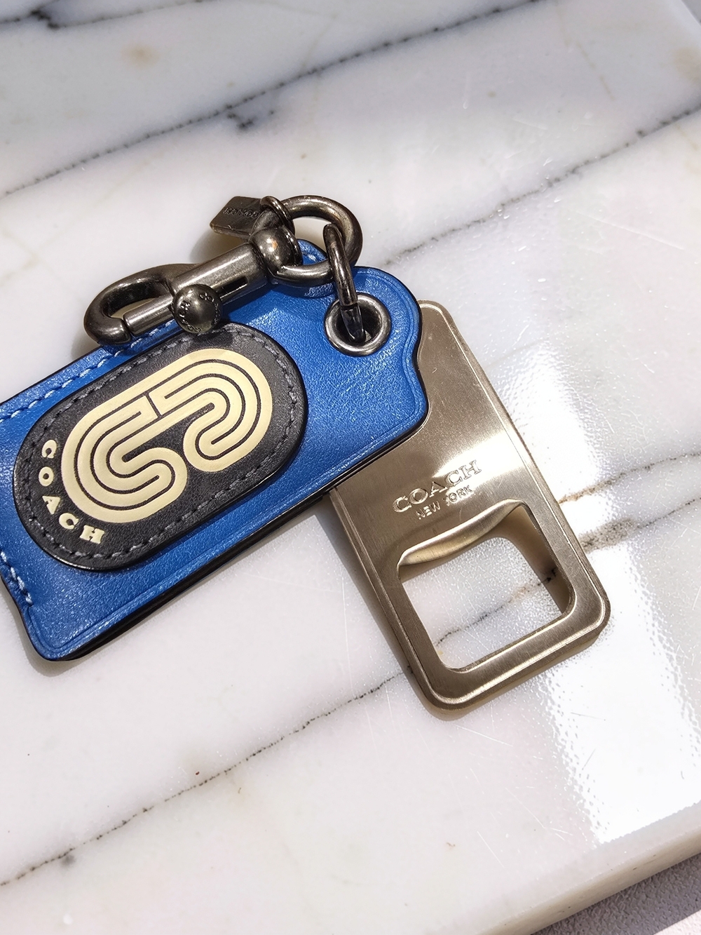 COACH Blue Leather Varsity Graphic Bottle Opener Keychain